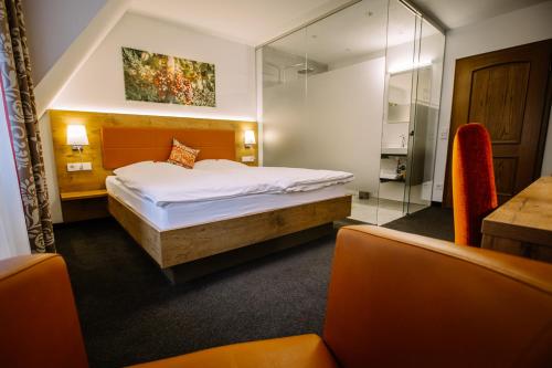 Krevet ili kreveti u jedinici u objektu Hotel Restaurant Lamm Rosswag