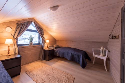 Voodi või voodid majutusasutuse Arctic Oasis Haven toas