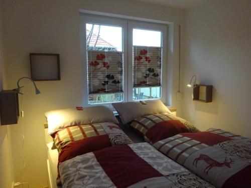 A bed or beds in a room at Ferienwohnung Relax