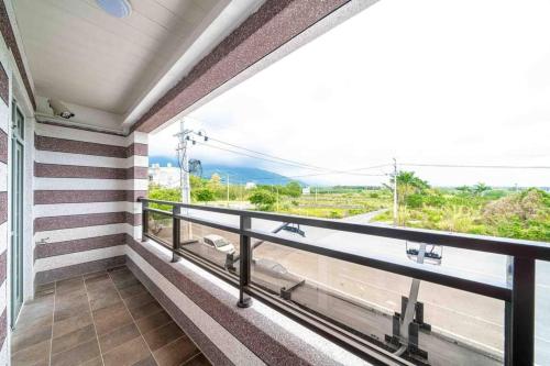 Ein Balkon oder eine Terrasse in der Unterkunft 湯姆熊休閒會館