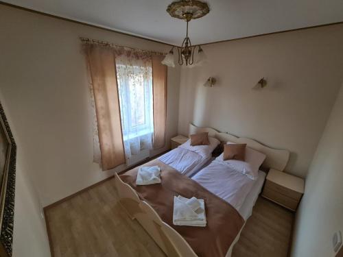 Hotel Mimozaにあるベッド