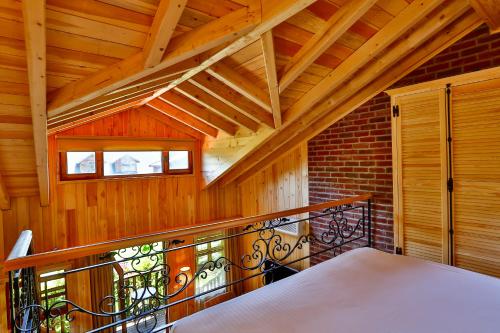 Ένα ή περισσότερα κρεβάτια σε δωμάτιο στο Tranquilla River Lodge