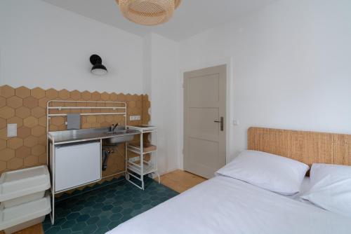 Ένα ή περισσότερα κρεβάτια σε δωμάτιο στο Klein aber OHO!
