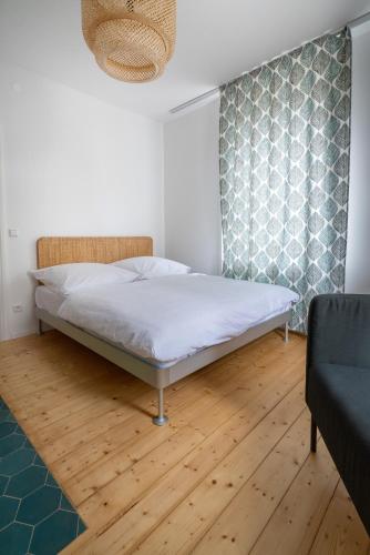 Ένα ή περισσότερα κρεβάτια σε δωμάτιο στο Klein aber OHO!