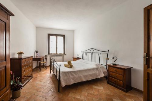 Katil atau katil-katil dalam bilik di Agriturismo La Ghiraia