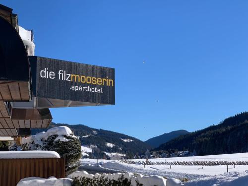 a sign at the top of a snow covered mountain at Die Filzmooserin - Apartments in Filzmoos, Filzmoos Card inklusive in Filzmoos