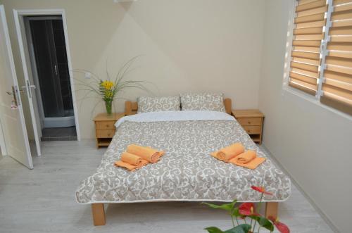 Ένα ή περισσότερα κρεβάτια σε δωμάτιο στο Guest House Konak Iris