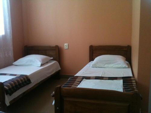 Кровать или кровати в номере White Guest House