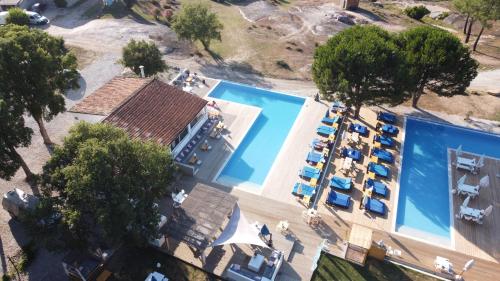 an overhead view of the pool at a resort at Quinta dos Corgos in Tábua