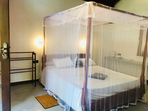 Cama o camas de una habitación en Mango Tree House
