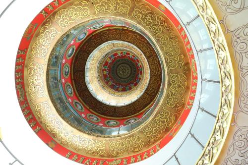 an overhead view of a spiral staircase in a building at Gadiraju Palace Convention Centre & Hotel in Visakhapatnam