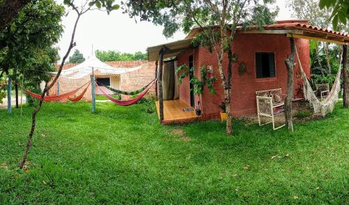 Parquinho infantil em Hostel & Camping Cavalcante