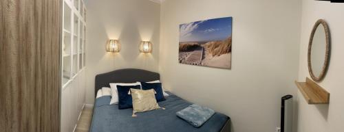 Posteľ alebo postele v izbe v ubytovaní Baltica Sea Apartment