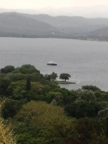a cruise ship in a large body of water at THEE VIEW in Hartbeespoort