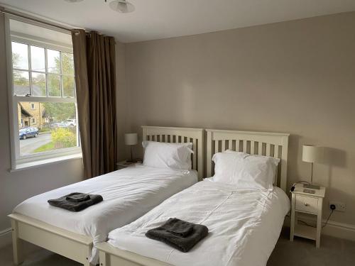 En eller flere senge i et værelse på Town House In The Heart of Pateley Bridge