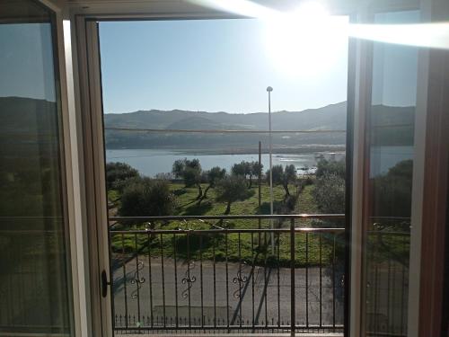 a view of a lake from a window at B&B Albachiara in Senise