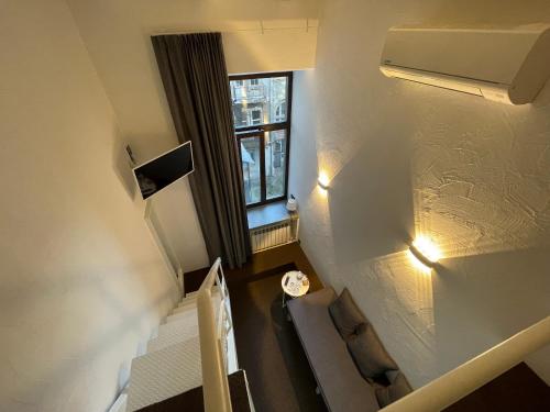 TV a/nebo společenská místnost v ubytování Lift Hotel Boutique - Derybasivska