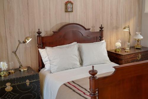 Posteľ alebo postele v izbe v ubytovaní Casa Centenária Povoa Nova