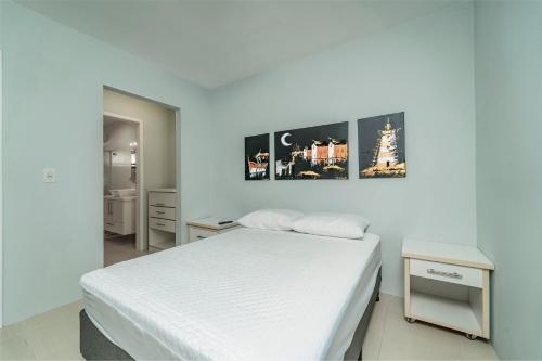 A bed or beds in a room at Casa na praia de Morrinhos Bombinhas para 10 pessoas, Excelente localização