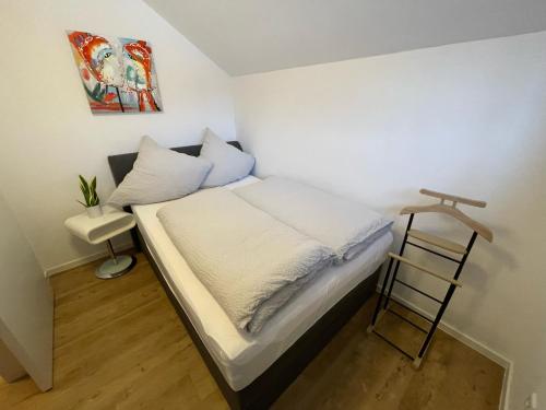 מיטה או מיטות בחדר ב-FeWo Jule Winterberg