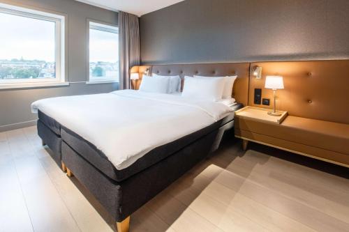 Ένα ή περισσότερα κρεβάτια σε δωμάτιο στο Radisson Blu Atlantic Hotel, Stavanger