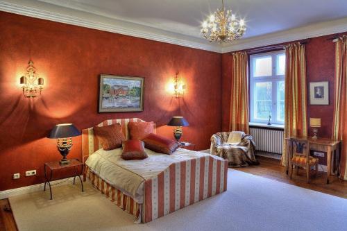 Postel nebo postele na pokoji v ubytování Herrenhaus Borghorst