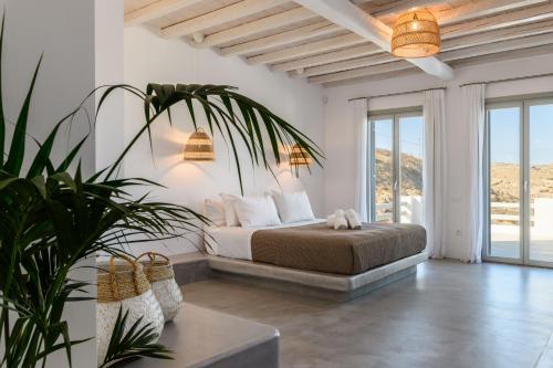 Ένα ή περισσότερα κρεβάτια σε δωμάτιο στο Villa Nerovino by Whitelist Mykonos