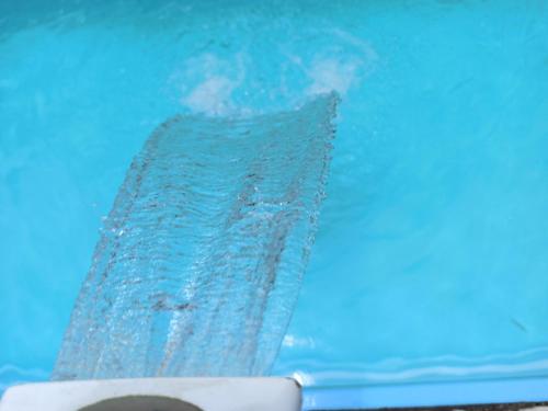 a close up of a toilet in the water at Pousada Canto Juquehy in Juquei