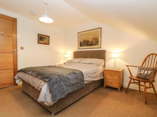 En eller flere senge i et værelse på Ebenezer Cottage