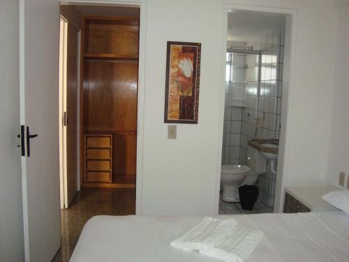 Tempat tidur dalam kamar di Residencial em Meireles