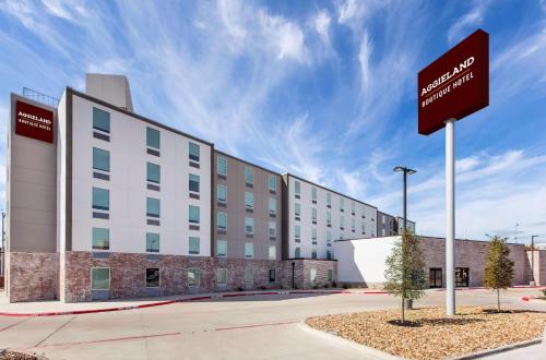 a rendering of the exterior of a building at Aggieland Boutique Hotel in College Station