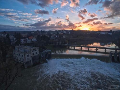 an aerial view of a waterfall at sunset at Apartman Ferenac in Ozalj