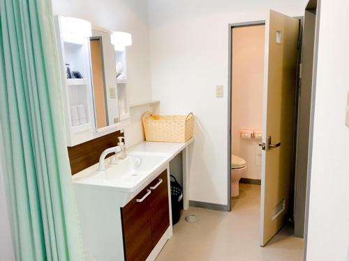 Koupelna v ubytování Hotel Caretta