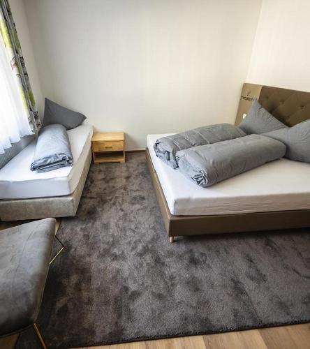 Postel nebo postele na pokoji v ubytování Apart Inntalerhof