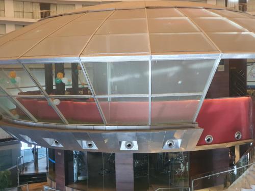 a model of a boat on display in a building at P C Homes at Belliza near airport in Surat