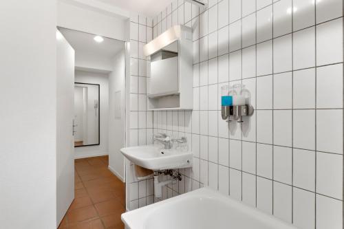 Ванная комната в Cozy Boutique Apartment at Mt. Rigi