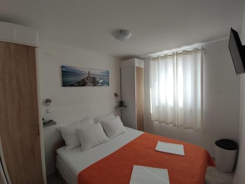 Postel nebo postele na pokoji v ubytování Apartman Mare Vir