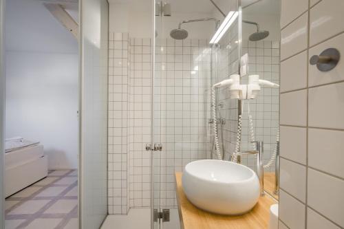 Ein Badezimmer in der Unterkunft Butik Apartments, by BQA