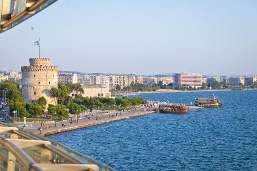 a view of a river and a city with a castle at Daios Luxury Living in Thessaloniki