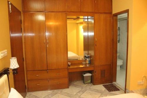 Ванна кімната в Maple Crest Service Apartment