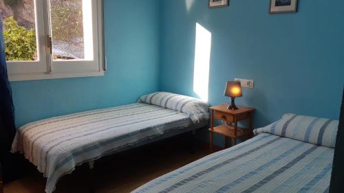 Ein Bett oder Betten in einem Zimmer der Unterkunft 2Sena - Lloret de Mar
