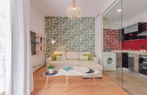 אזור ישיבה ב-Cozy apartment in the heart of Malaga by REMS