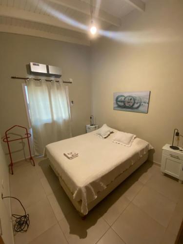 een slaapkamer met een bed in een kamer bij Costa Luxe Planta Alta in Posadas