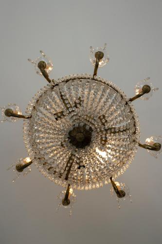a glass chandelier with aventricular at IL PALAZZO - Luxury Home & Event in Cosenza