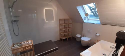 Een badkamer bij Ferienanlage Müritz Seeromantik