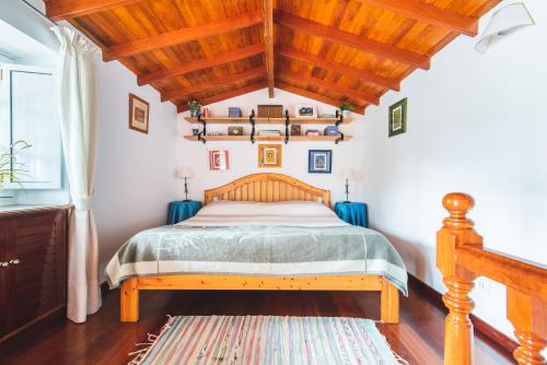 Ein Bett oder Betten in einem Zimmer der Unterkunft Home2Book Las Terrazas de Valleseco