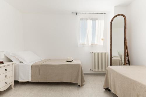 Posteľ alebo postele v izbe v ubytovaní Villa Antonia by Wonderful Italy