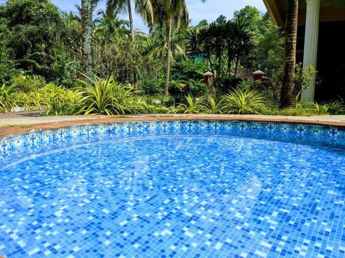 Бассейн в Tangerine Stay - Friends & Family 4BHK Villa, Goa или поблизости