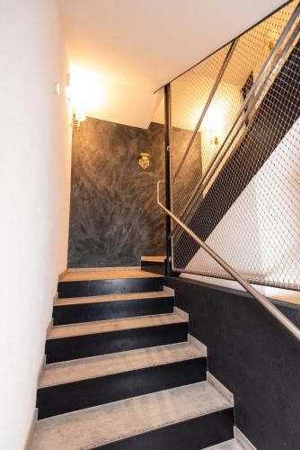 a set of stairs in a building at Boutique Hotel Edelweiss in Sankt Anton am Arlberg