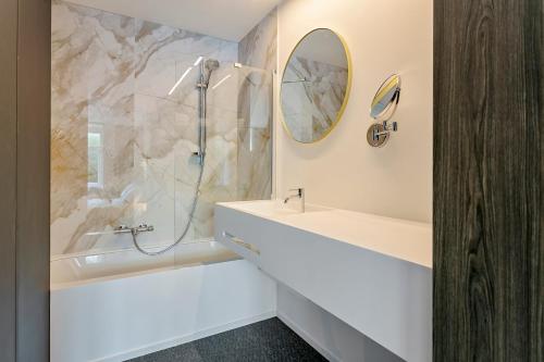 Een badkamer bij Hotel Astoria